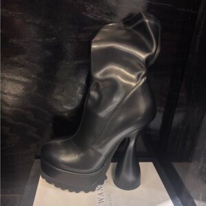 Sleek Black Heeled Boots